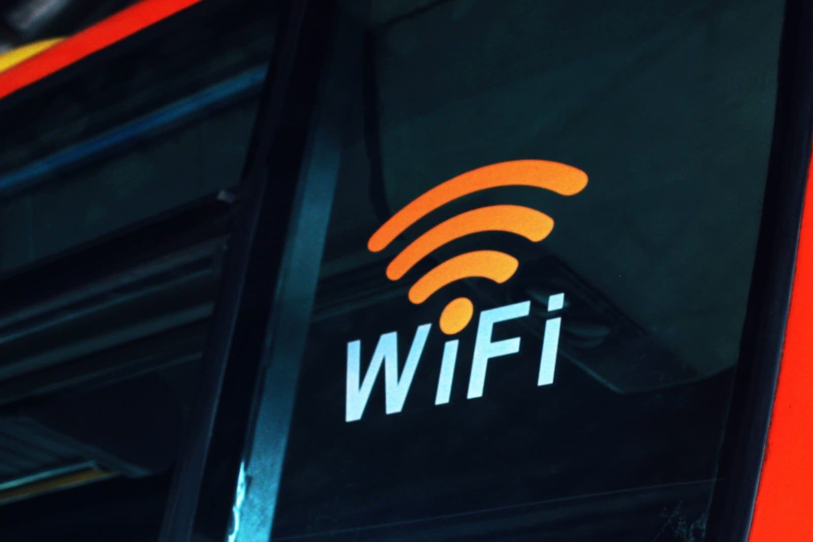 Glowing Wi-Fi symbol on a dark surface
