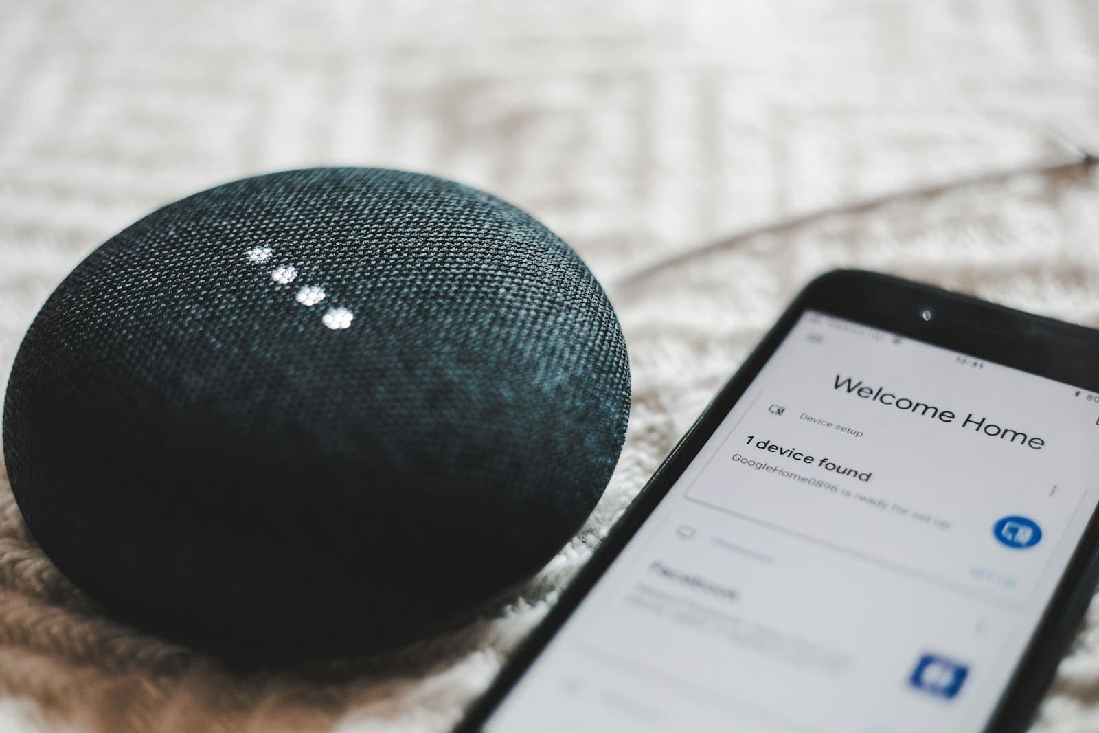 Smart speaker and smartphone with a home automation app
